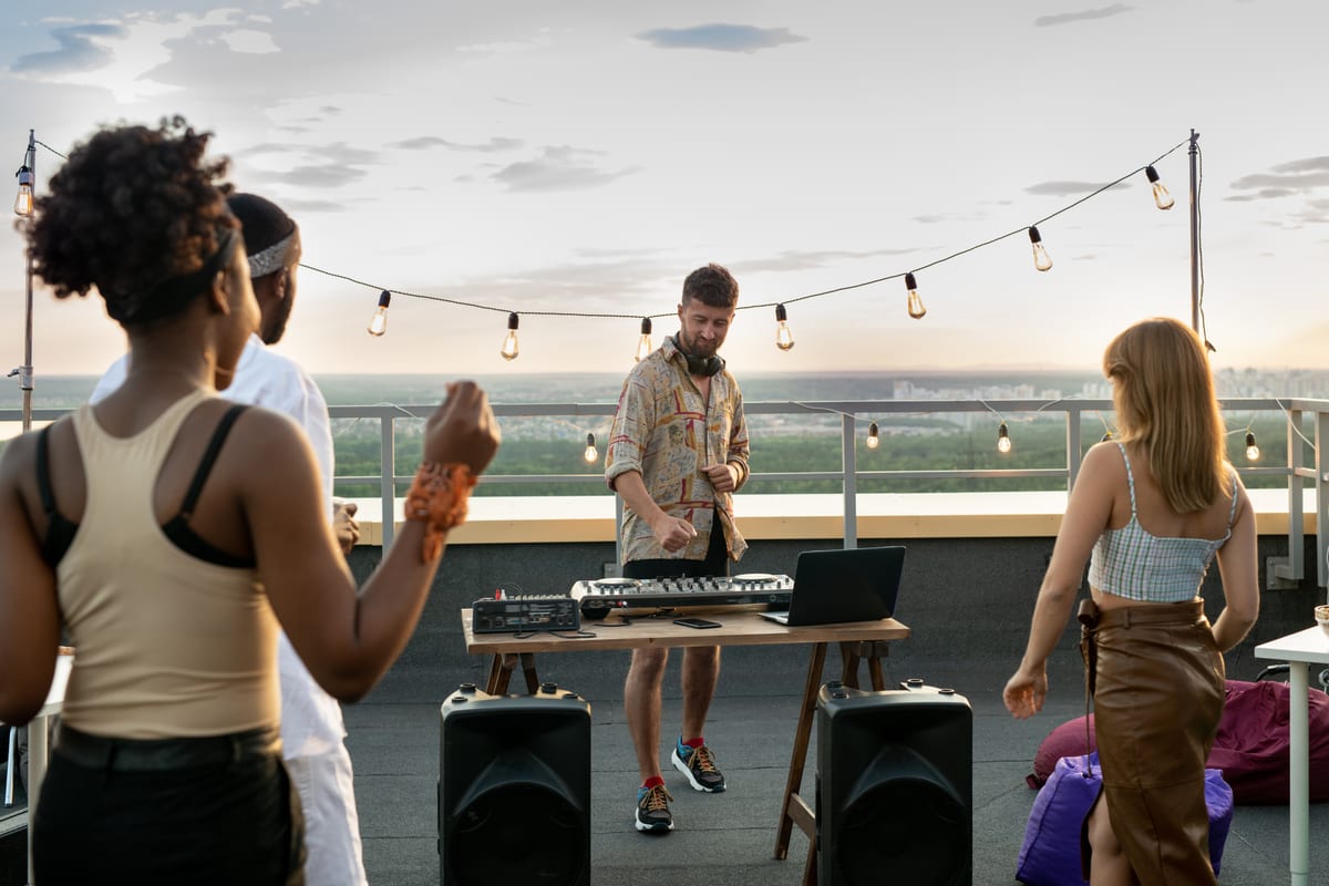 Sound System hire — rooftop party with dj playing music outdoors | Panda Party Hire Hire sound system — rooftop party with dj playing music outdoors for parties and events in Johannesburg, Sandton and Randburg