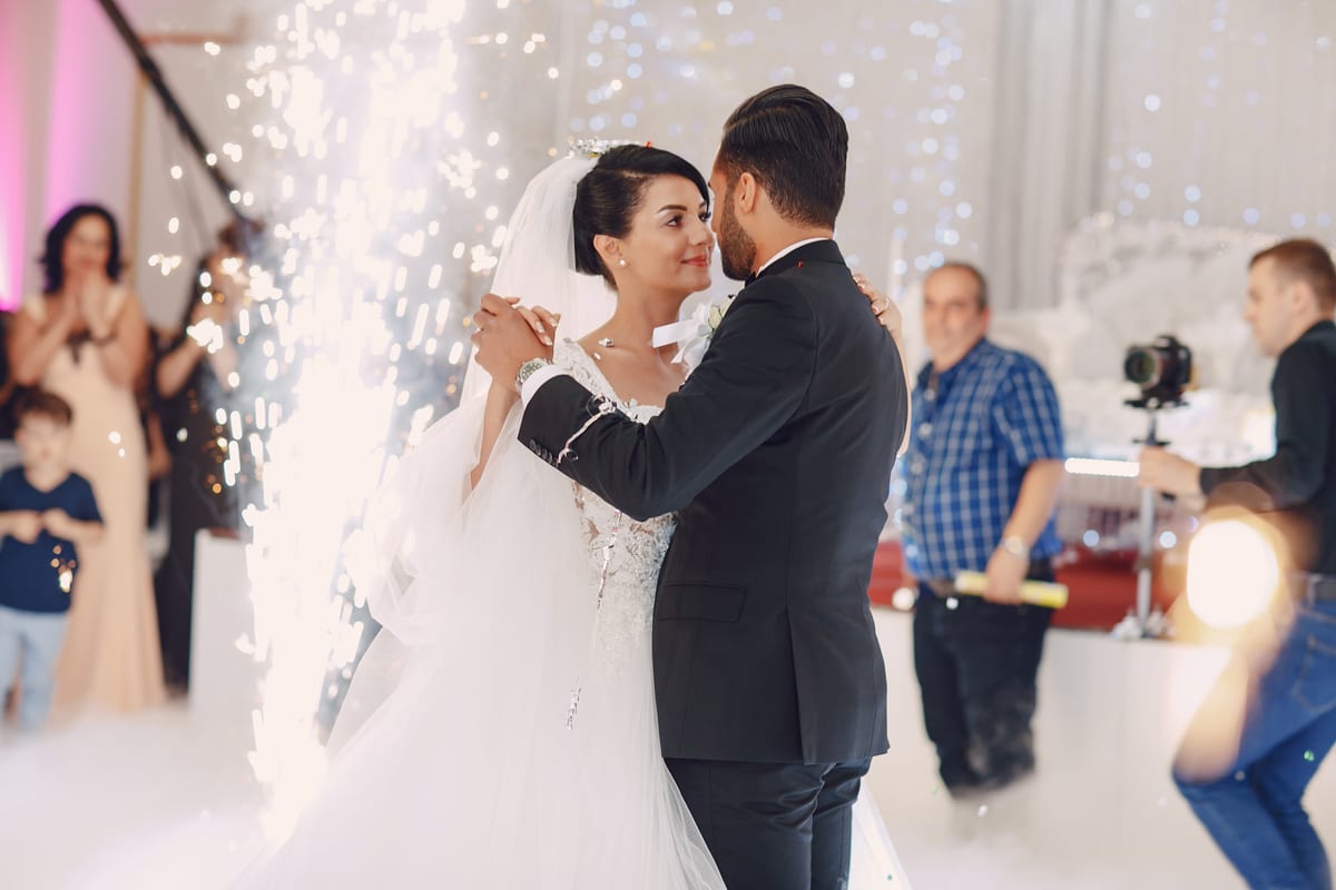 Sound System hire — bride and groom embrace with fireworks at wedding | Panda Party Hire Hire sound system — bride and groom embrace with fireworks at wedding for parties and events in Johannesburg, Sandton and Randburg