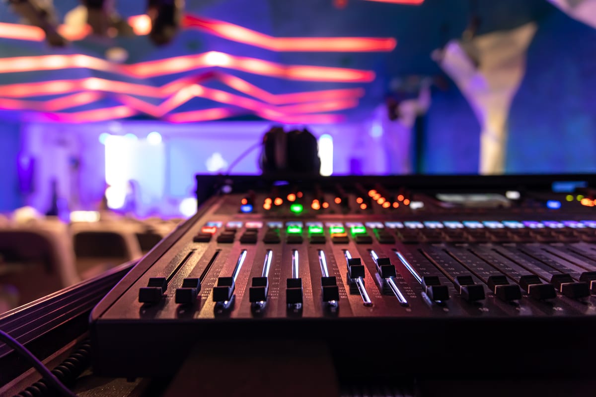 Sound System hire — close up sound music mixer control panel on blurr | Panda Party Hire Hire sound system — close up sound music mixer control panel on blurr for parties and events in Johannesburg, Sandton and Randburg