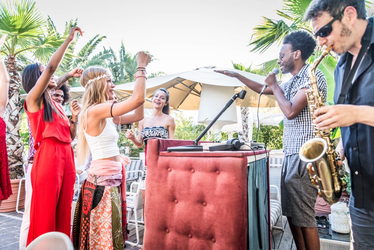 Sound System hire — friends making party in a lounge bar | Panda Party Hire Hire sound system — friends making party in a lounge bar for parties and events in Johannesburg, Sandton and Randburg