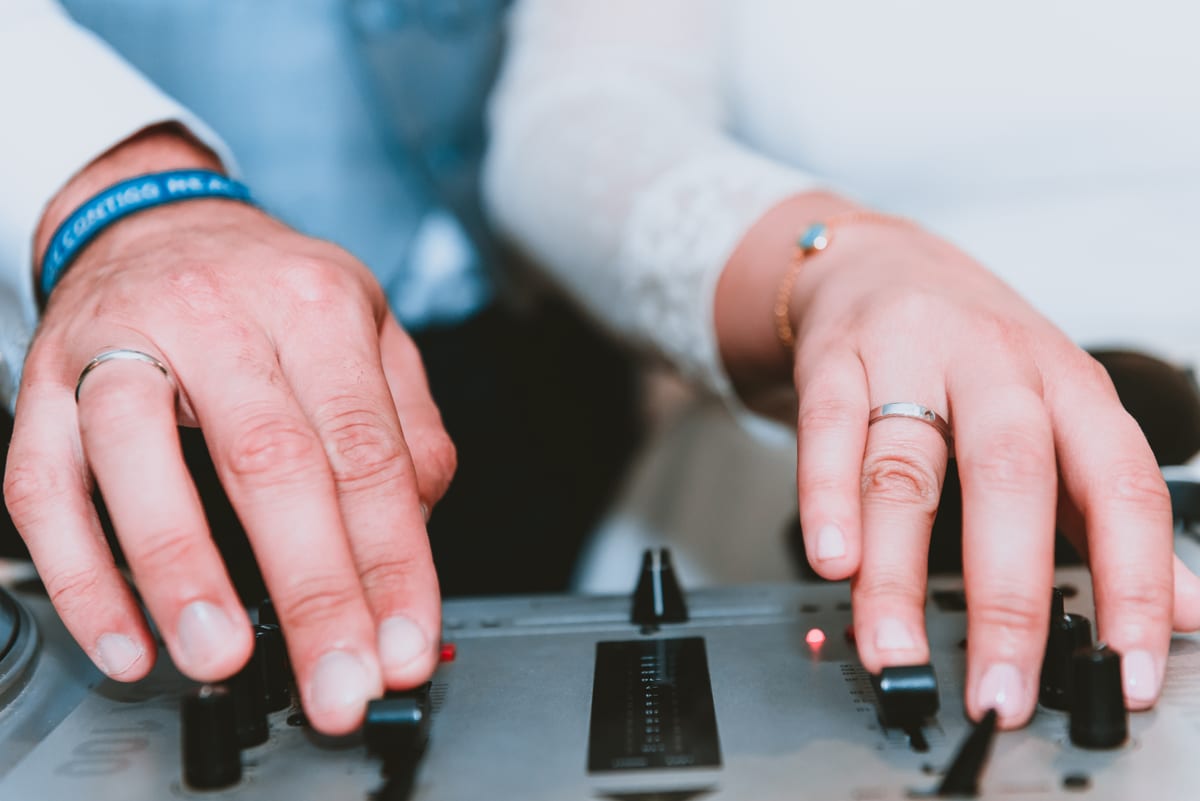 Sound System hire — hands touching a mixing board in studio | Panda Party Hire Hire sound system — hands touching a mixing board in studio for parties and events in Johannesburg, Sandton and Randburg
