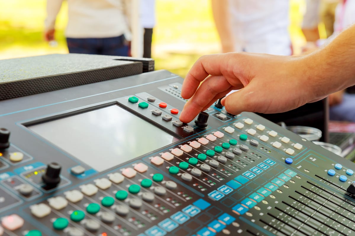 Sound System hire — sound mixer in action hand music console | Panda Party Hire Hire sound system — sound mixer in action hand music console for parties and events in Johannesburg, Sandton and Randburg